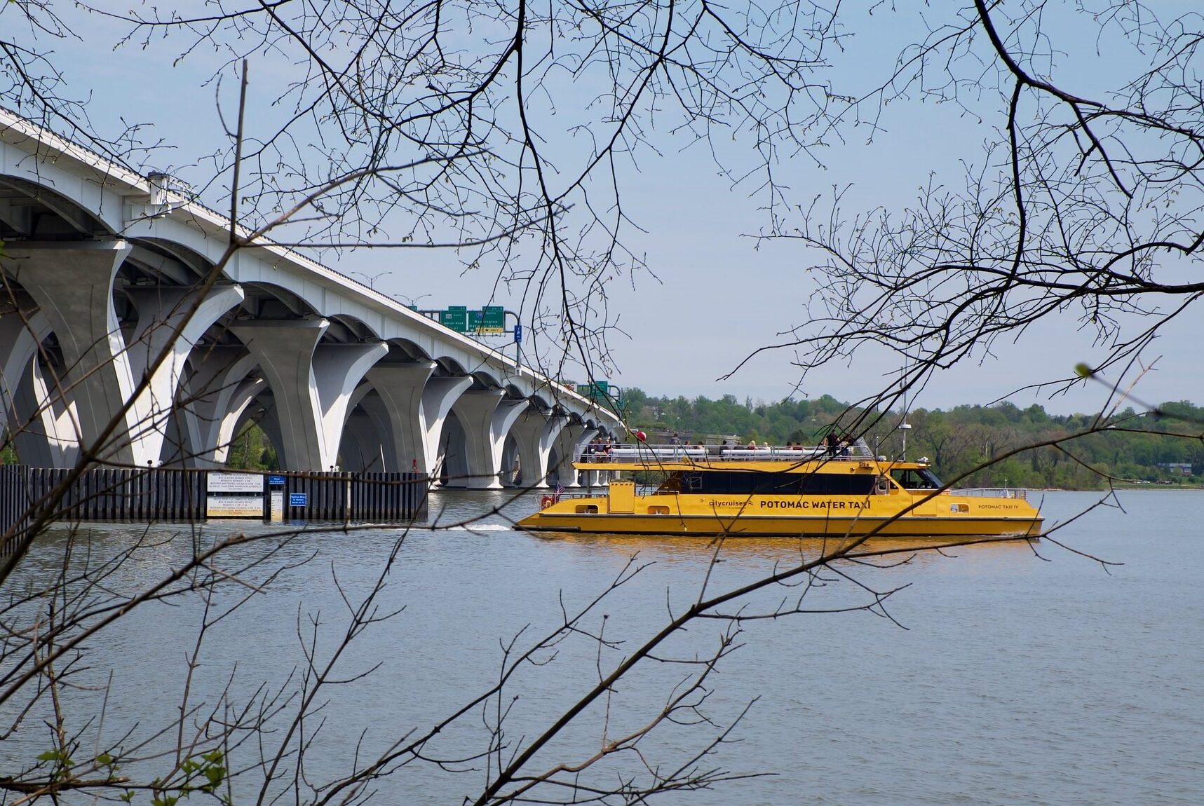 Potomac water taxi with Woodrow Wilson Bridge in the background.